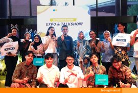 Students of FEB UGM presenting business ideas at the 2025 Entrepreneurship Expo, with exhibition booths and MSME showcases in the background.
